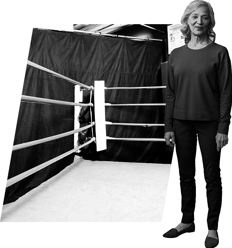 Cynthia standing upright in a boxing ring